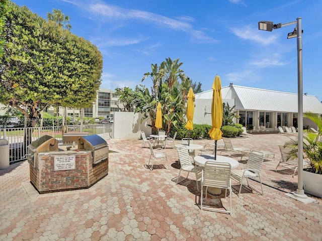 view of patio featuring exterior kitchen and grilling area