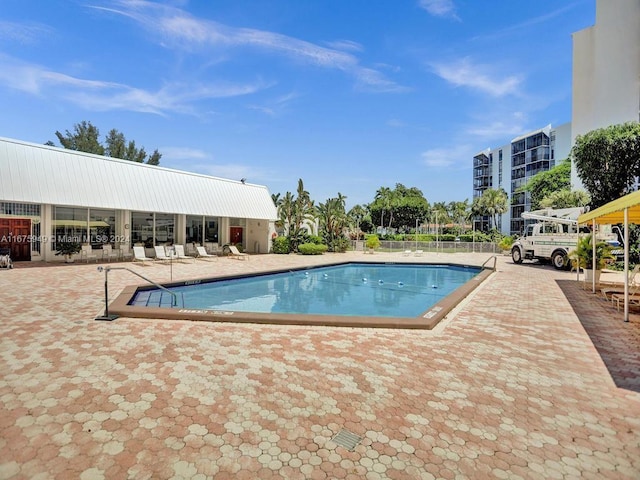 view of pool featuring a patio area