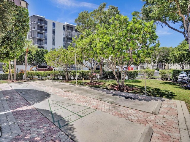 20400 W Country Club Dr Unit 301, Aventura, FL 33180 - view of community featuring shuffleboard