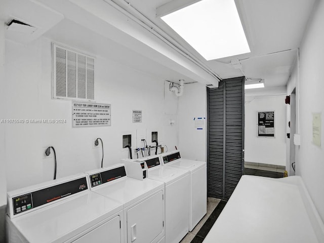 washroom featuring separate washer and dryer