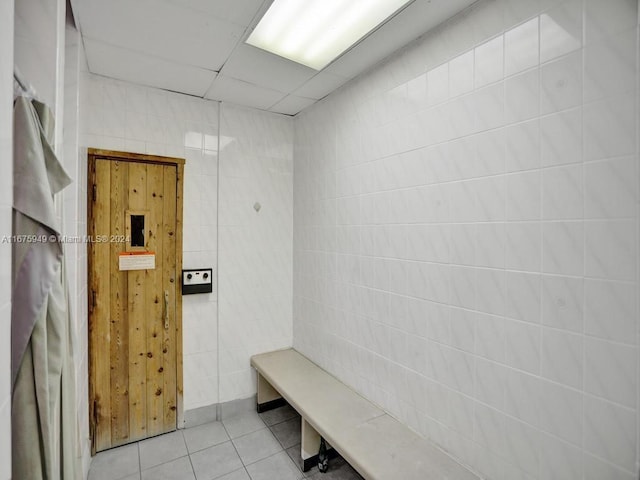 bathroom featuring tile walls and tile patterned floors