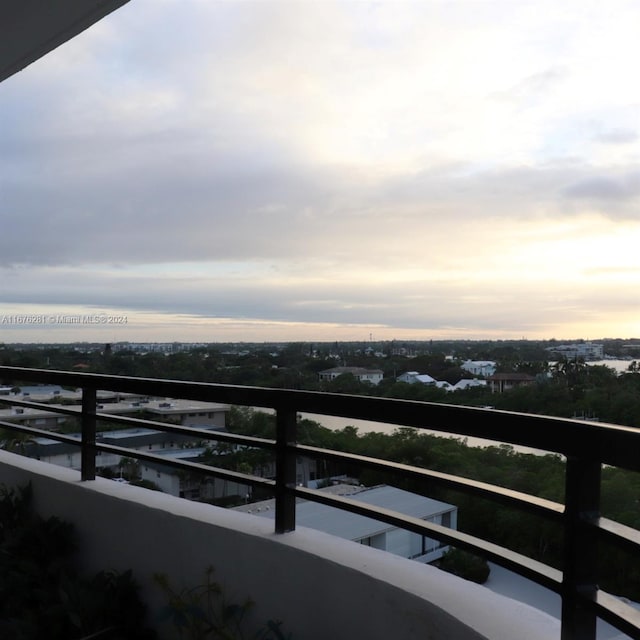 view of balcony at dusk