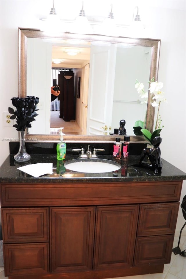 bathroom featuring sink and tile patterned floors