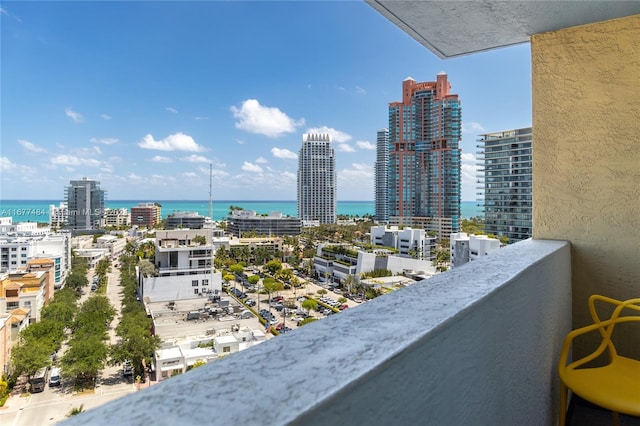 balcony with a city view and a water view