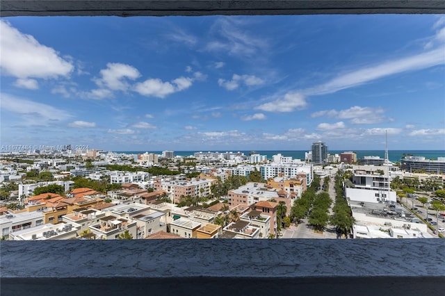 property's view of city featuring a water view