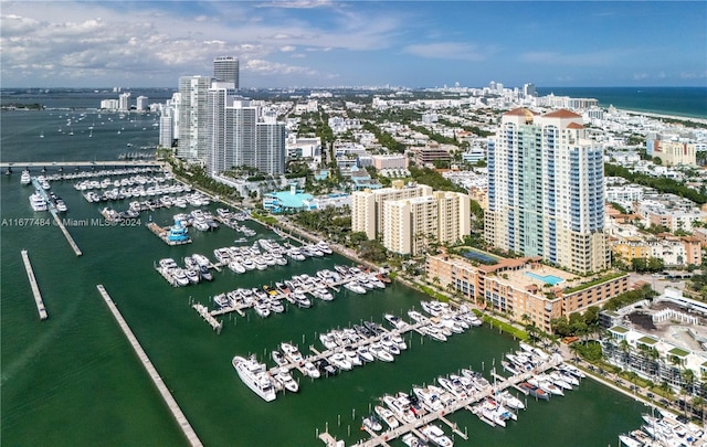 bird's eye view featuring a city view and a water view
