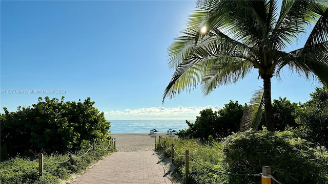 property view of water with a beach view