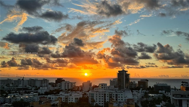 property's view of city with a water view