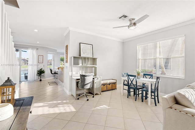 tiled living room with ornamental molding and ceiling fan