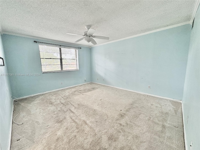 unfurnished room featuring crown molding, a textured ceiling, carpet flooring, and ceiling fan