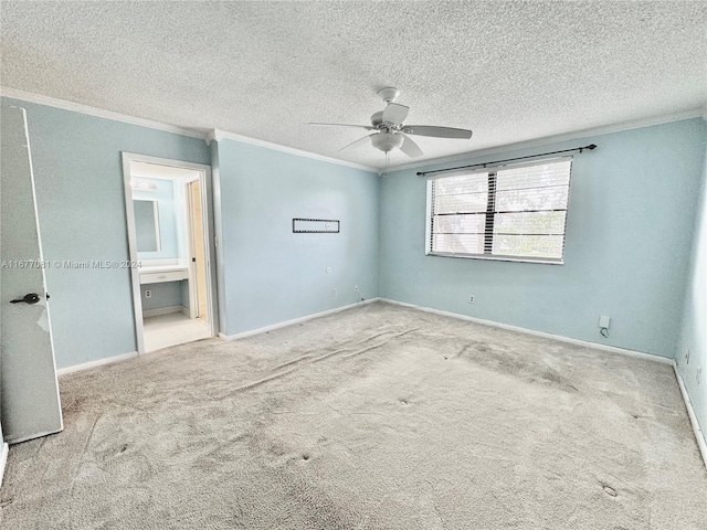 empty room featuring light carpet, crown molding, and ceiling fan