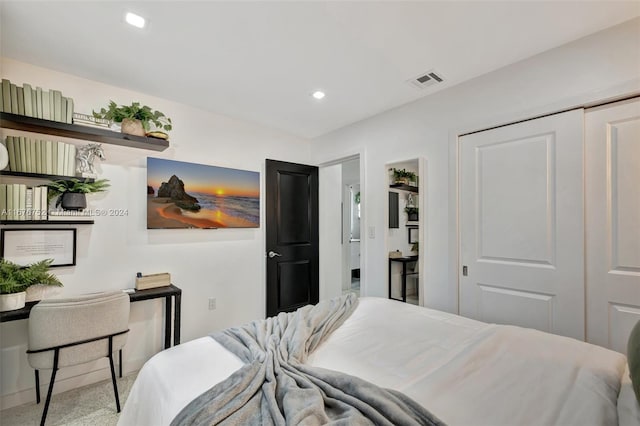 bedroom with a closet and carpet floors