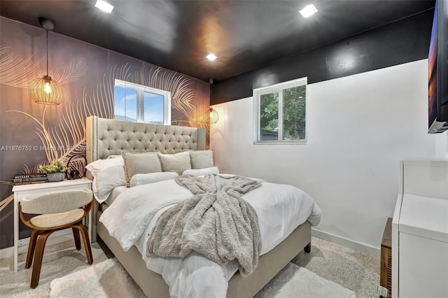 bedroom featuring light colored carpet