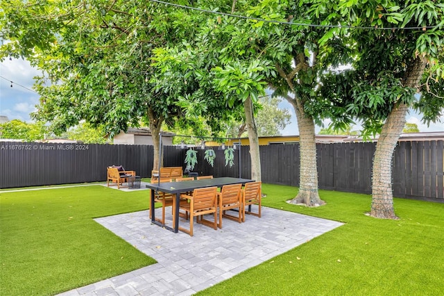 view of yard with a patio area