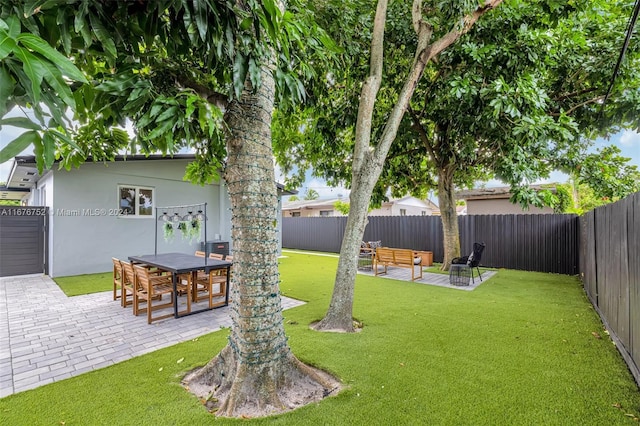 view of yard with a patio area