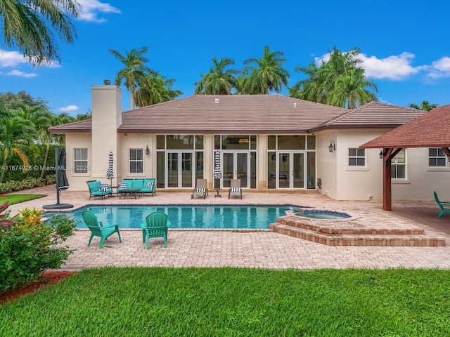 3601 SW 129th Ave, Miami, FL 33175 - view of pool featuring french doors, a patio area, and a pool with connected hot tub