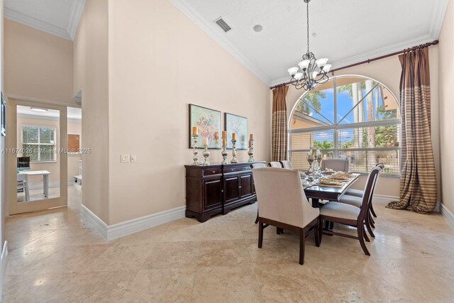 3601 SW 129th Ave, Miami, FL 33175 - dining space with a chandelier, ornamental molding, plenty of natural light, and a towering ceiling