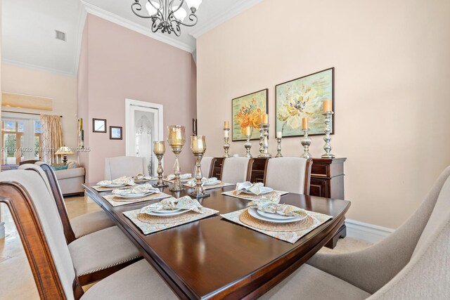 3601 SW 129th Ave, Miami, FL 33175 - dining space featuring crown molding, french doors, a chandelier, and a high ceiling