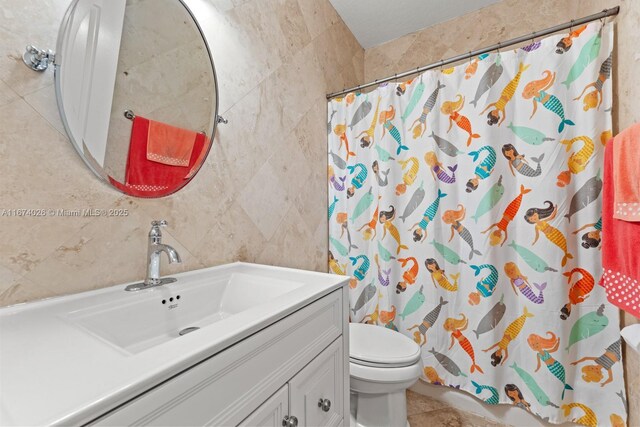 3601 SW 129th Ave, Miami, FL 33175 - bathroom featuring tile walls, vanity, a shower with curtain, and tile patterned flooring