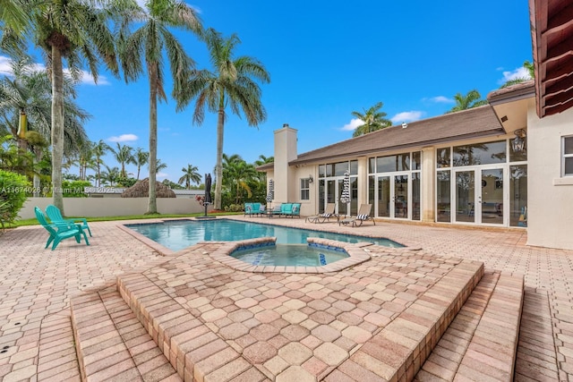 3601 SW 129th Ave, Miami, FL 33175 - view of pool with a patio area and a pool with connected hot tub