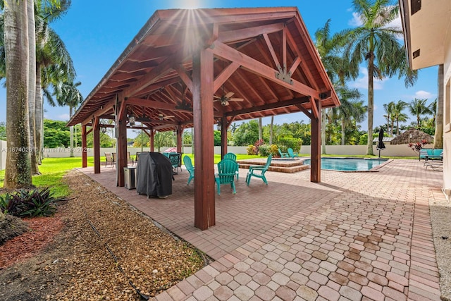 view of home's community featuring a pool, a gazebo, and a patio