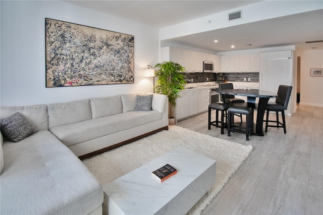 living room featuring light hardwood / wood-style floors