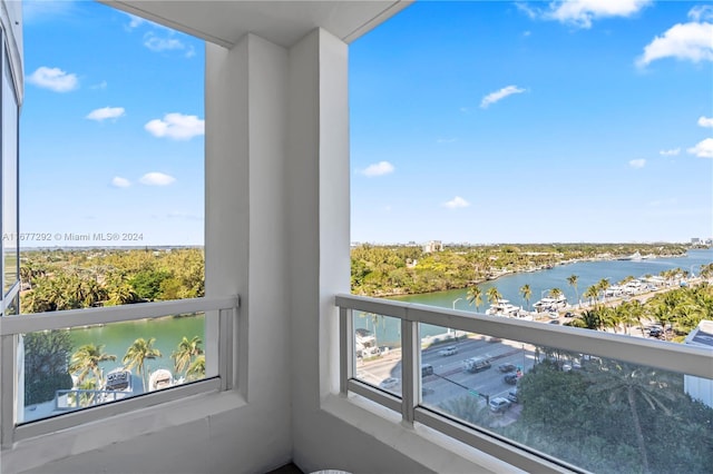 balcony featuring a water view