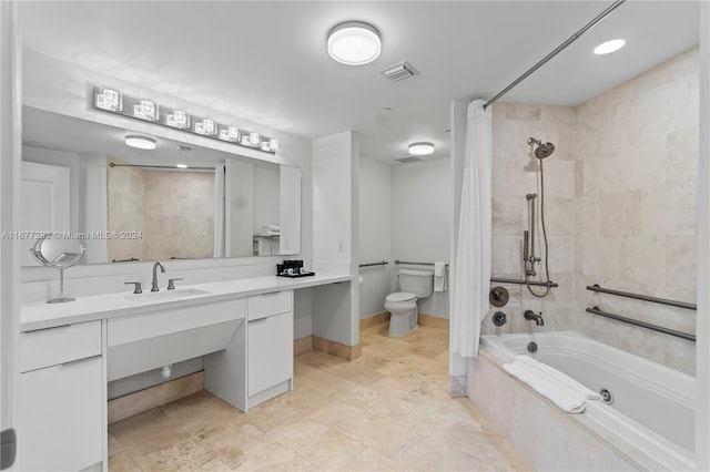 full bathroom with vanity, toilet, and shower / tub combo