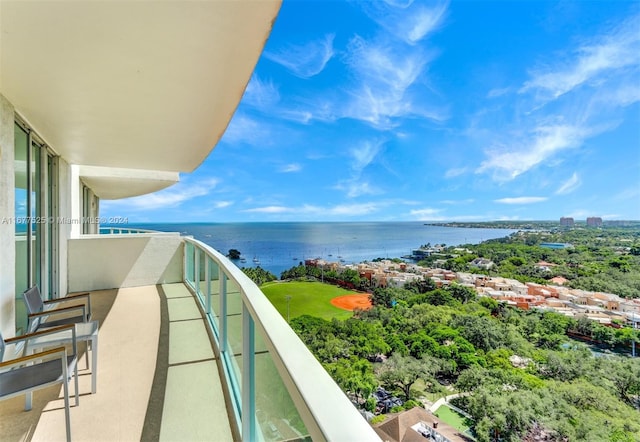 balcony featuring a water view