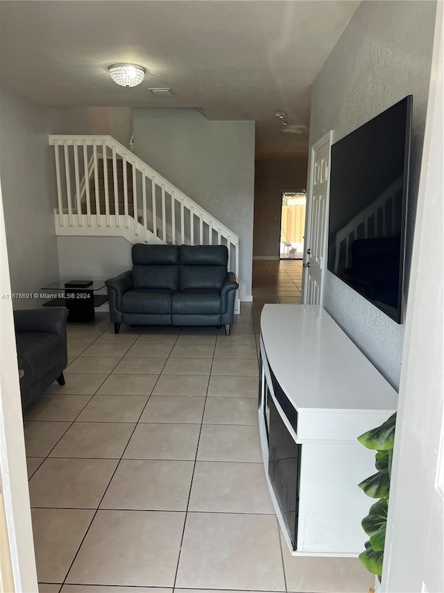 living room featuring tile patterned floors