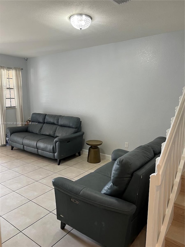 living room with light tile patterned floors