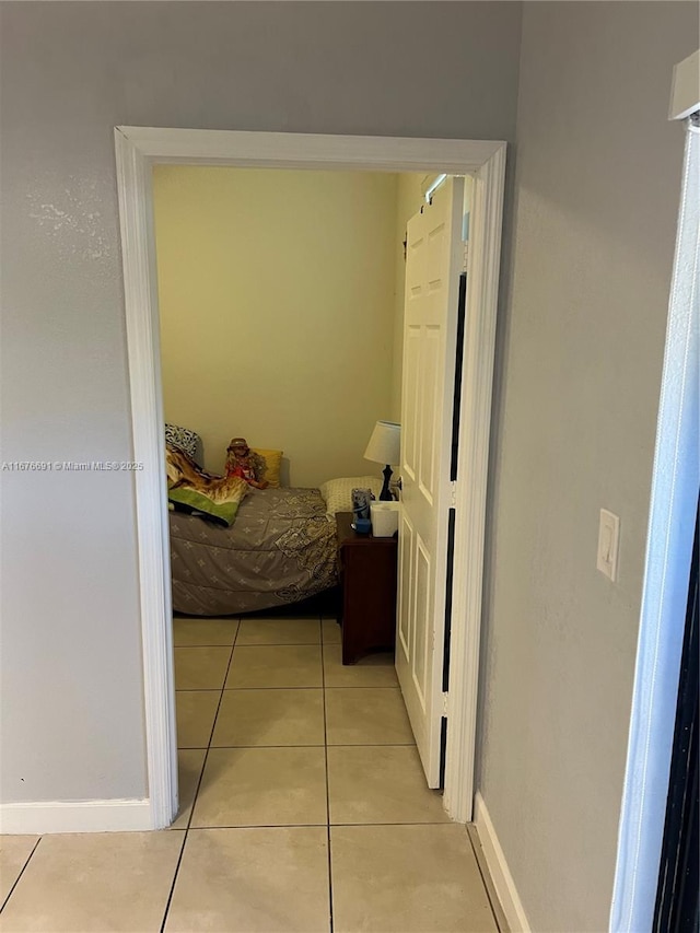 152 SE 37th Ter Unit 152, Homestead, FL 33033 - bedroom featuring baseboards and light tile patterned flooring