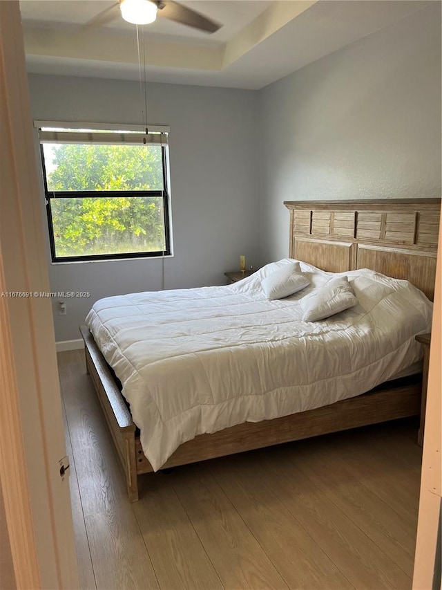 152 SE 37th Ter Unit 152, Homestead, FL 33033 - bedroom with a ceiling fan and wood finished floors