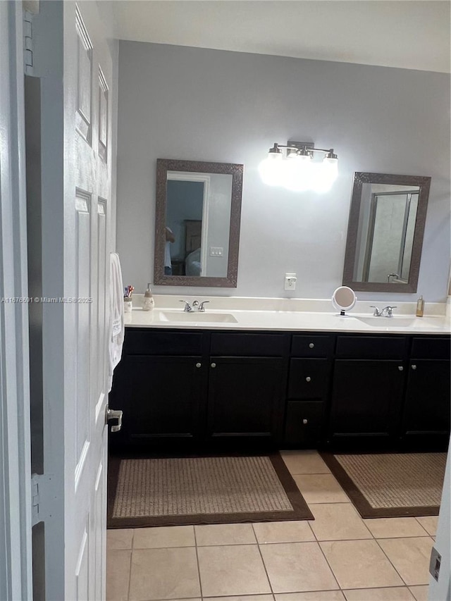 152 SE 37th Ter Unit 152, Homestead, FL 33033 - bathroom with tile patterned floors, double vanity, and a sink