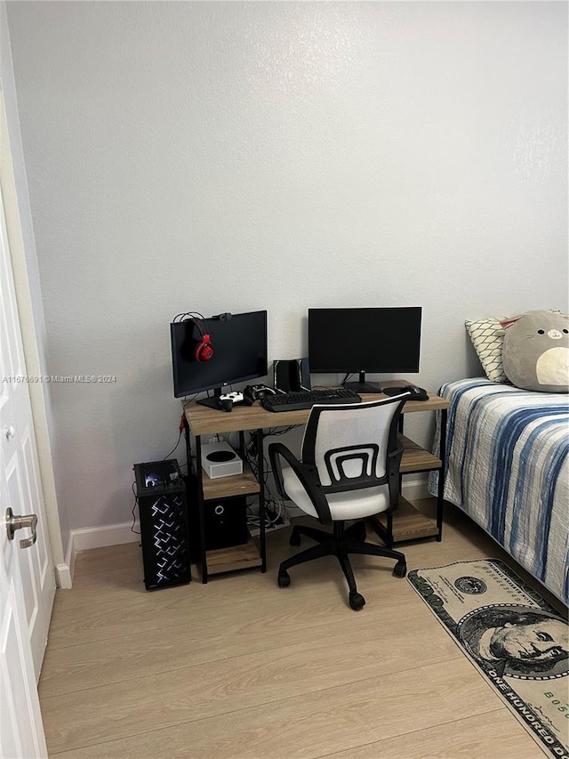 bedroom featuring light hardwood / wood-style floors