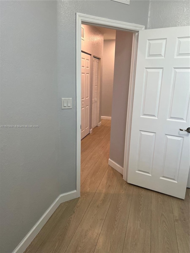 152 SE 37th Ter Unit 152, Homestead, FL 33033 - hall featuring light wood finished floors and baseboards