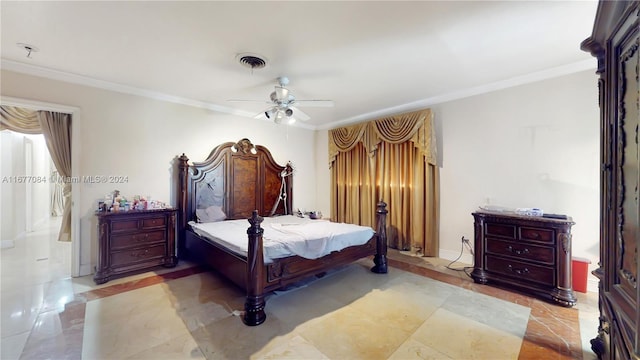 bedroom with ceiling fan and ornamental molding