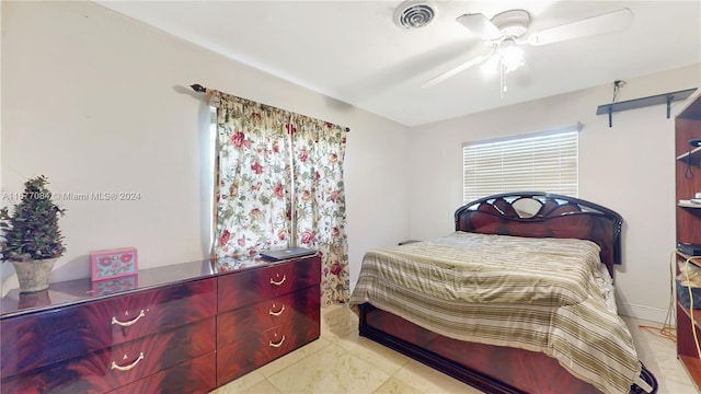 bedroom featuring ceiling fan