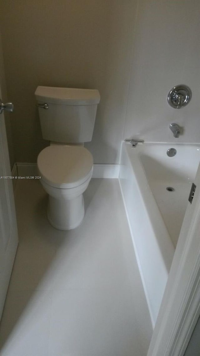 bathroom with independent shower and bath, toilet, and tile patterned flooring