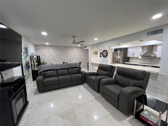 living room featuring ceiling fan