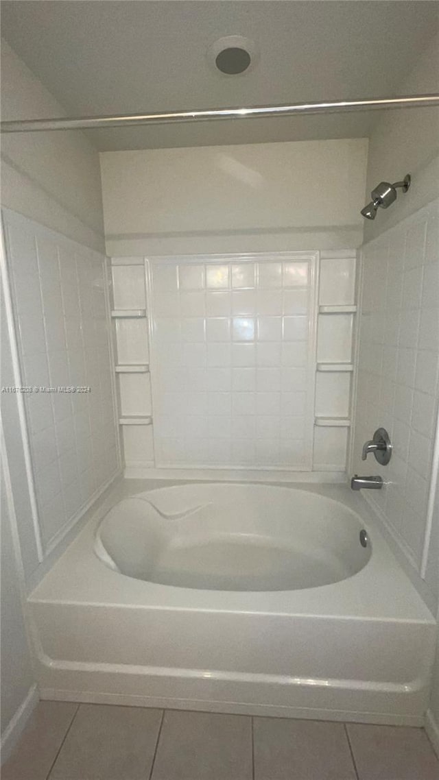 full bathroom with shower / washtub combination and tile patterned floors
