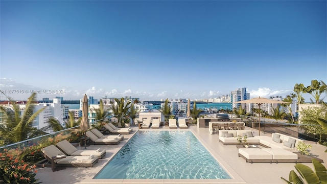 view of swimming pool featuring a patio and an outdoor hangout area