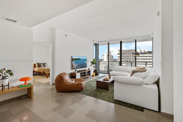 88 SW 7th St Unit 1710, Miami, FL 33130 - living area featuring floor to ceiling windows and tile patterned floors