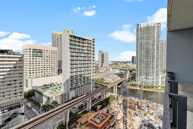 property's view of city featuring a water view