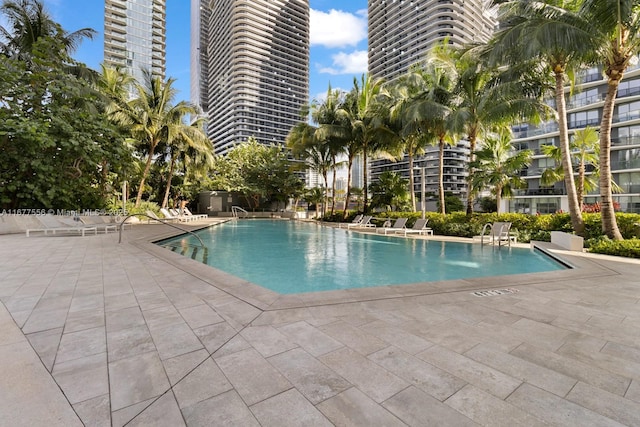 88 SW 7th St Unit 1710, Miami, FL 33130 - community pool featuring a patio area