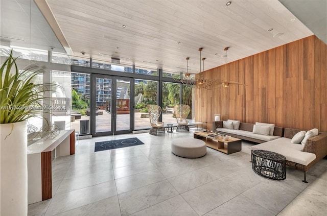 88 SW 7th St Unit 1710, Miami, FL 33130 - common area with wood walls, a wall of windows, and wooden ceiling