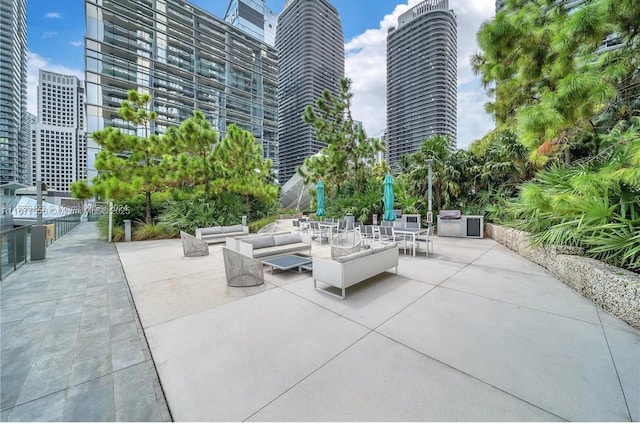 88 SW 7th St Unit 1710, Miami, FL 33130 - view of home's community with a city view, a patio area, and outdoor lounge area