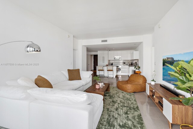 88 SW 7th St Unit 1710, Miami, FL 33130 - living room with light tile patterned floors