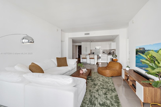 88 SW 7th St Unit 1710, Miami, FL 33130 - living area with light tile patterned floors