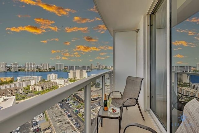 balcony at dusk with a water view